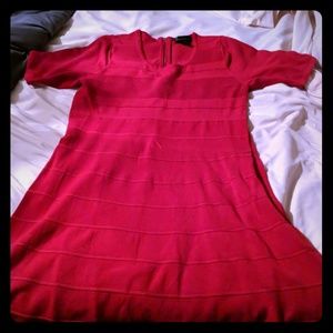 Red knee-length knit dress